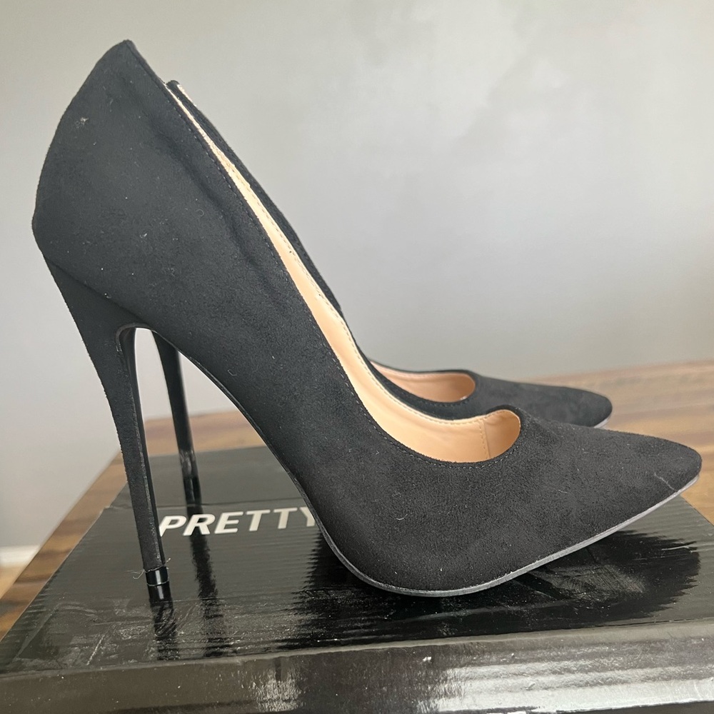 Black suede pumps